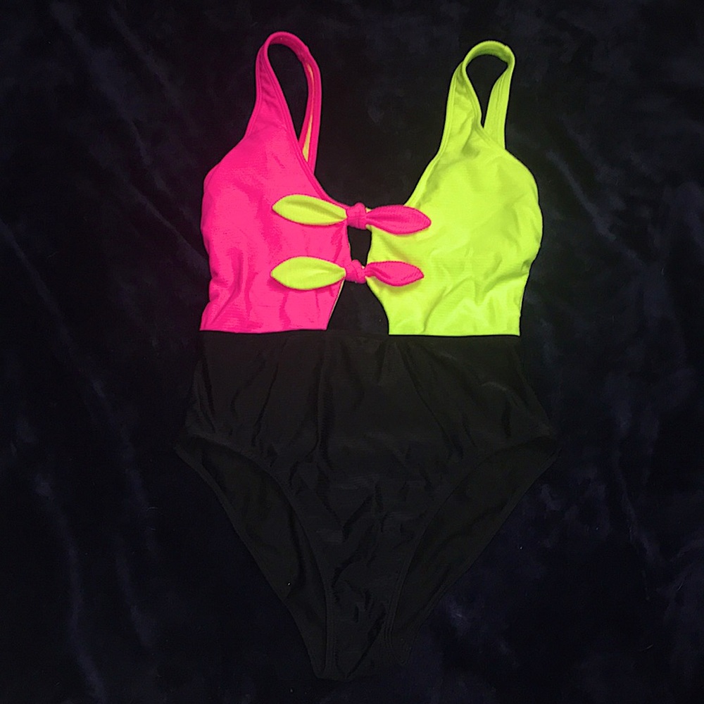 neon pink and yellow one piece swim suit